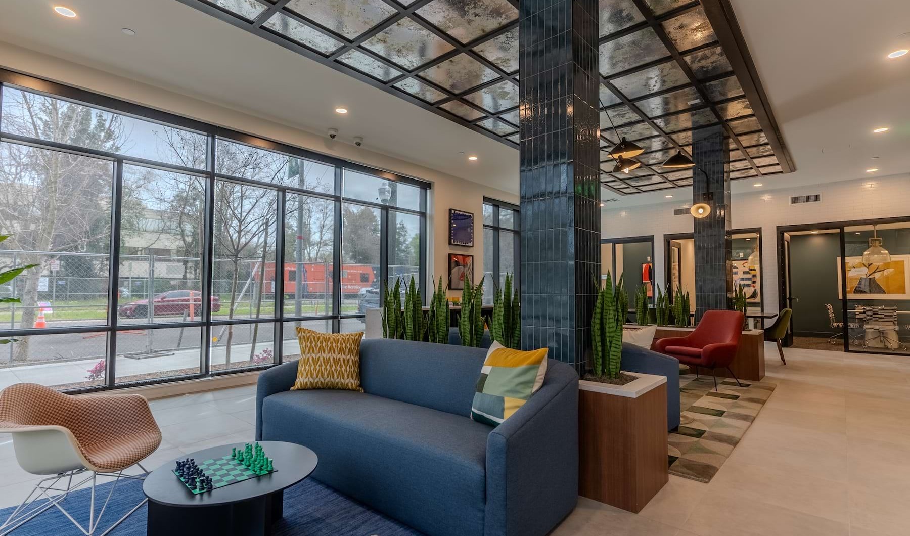 Perfect Blend of Sophistication and Comfort lounge with modern decor and ample seating