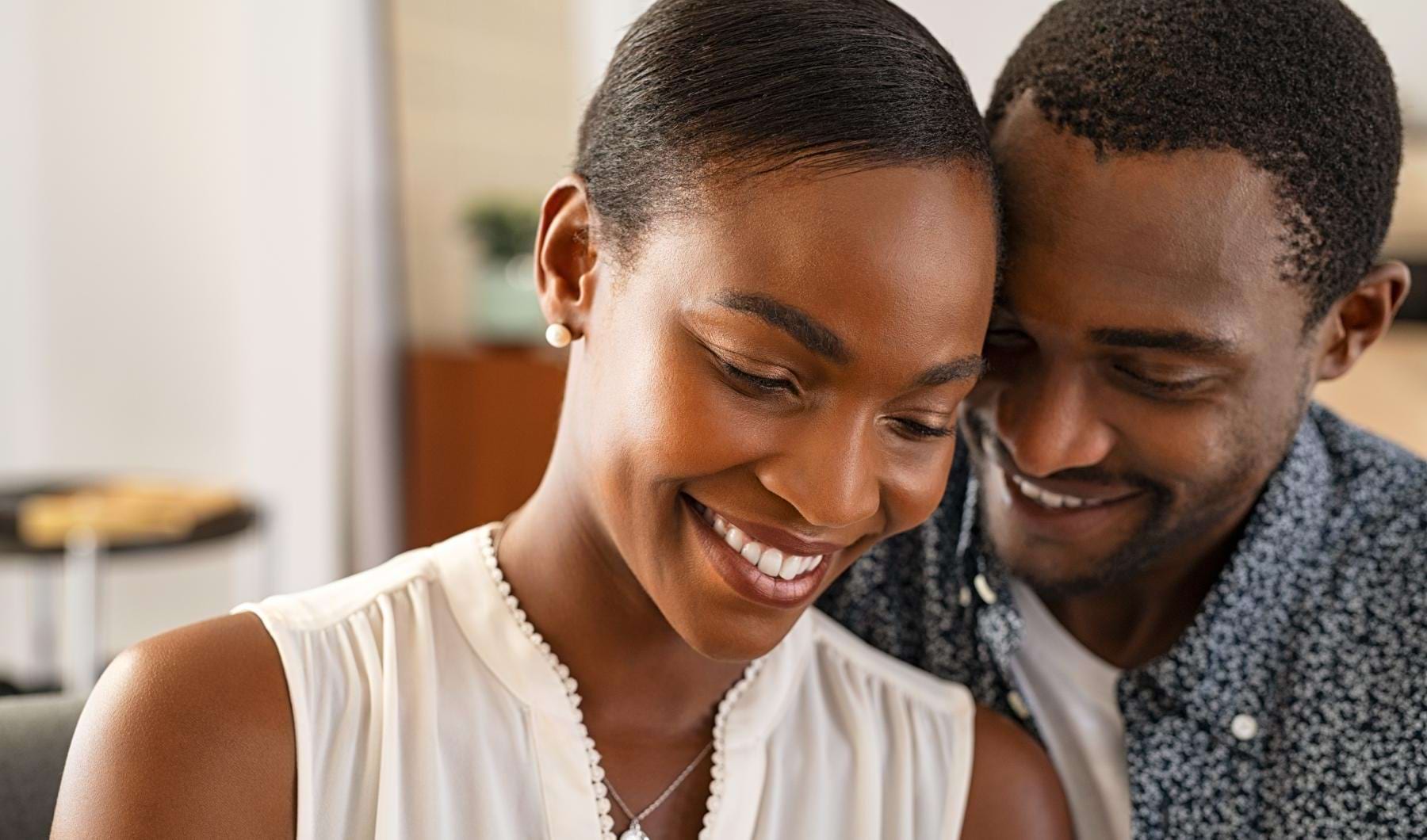 Settle into comfort at The Bernice a man and a woman smiling